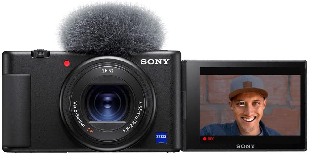 Sony ZV-1 Digital Camera Black DCZV1/B, 2 x 64GB Memory Card, Case, 3 x NP-BX1 Battery, Card Reader, LED Light, Corel Photo Software, HDMI Cable, Rode Compact Mic, Charger, and More