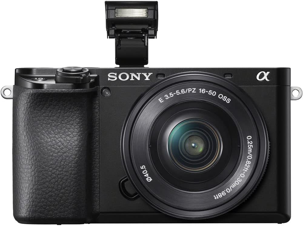 Sony Alpha a6100 Mirrorless Digital Camera (ILCE6100L/B) with 16-50mm Lenses with Flash, Extra Battery, 64GB Memory Card, Padded Bag, and More - Extra Battery Bundle (Renewed)