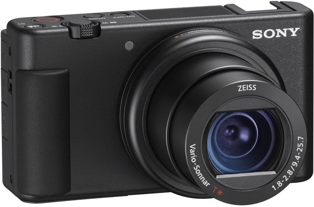 Sony ZV-1 Digital Vlogging Camera Black (DCZV1/B) – 20.1 MP 1' Sensor, 24–70 mm ZEISS Lens, 4K HDR Video, Flip Screen w/ 64GB Card, Photo Software, 2 x NP-BX1 Battery, Card Reader and More