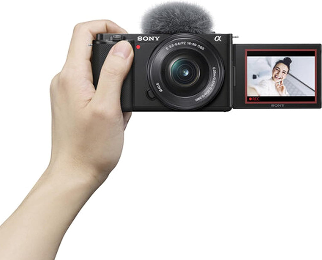 Sony ZV-E10 Mirrorless Camera with 16-50mm Lens, 128GB Extreem Speed Memory,.43 Wide Angle & 2X Lenses, Case. Tripod, Filters, Hood, Grip,Spare Battery & Charger, Editing Software Kit -Deluxe Bundle